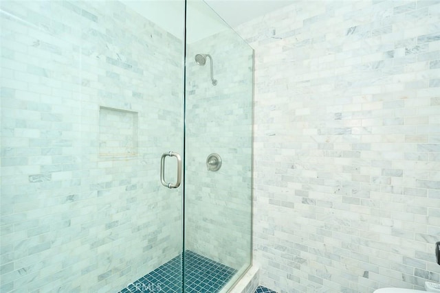 bathroom with an enclosed shower