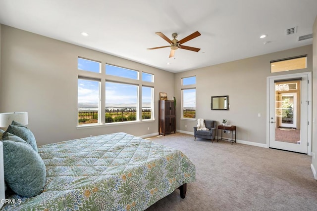 carpeted bedroom featuring ceiling fan