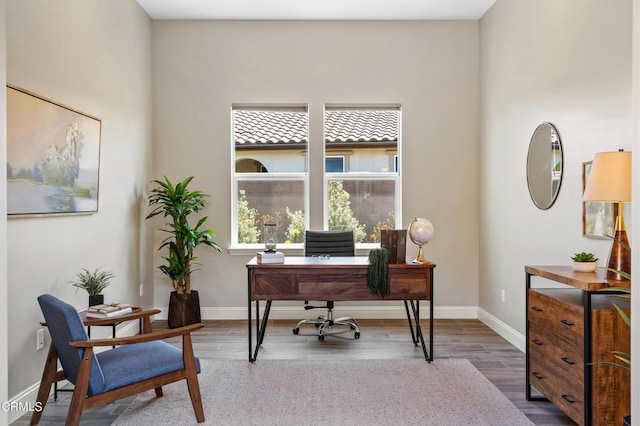 office area with dark hardwood / wood-style floors