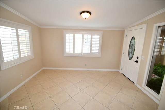 tiled entryway with vaulted ceiling and ornamental molding