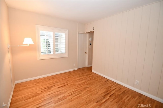 empty room featuring light hardwood / wood-style floors