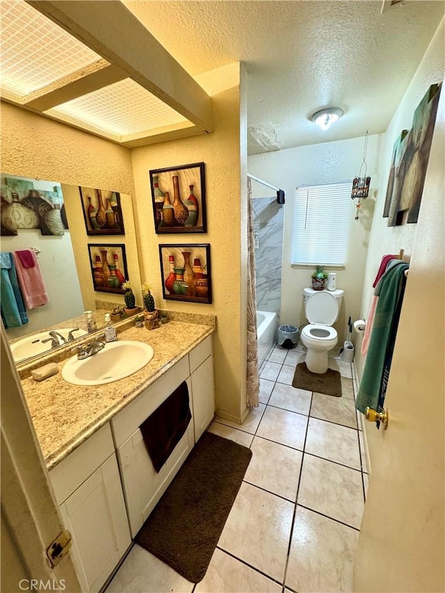 full bathroom with toilet, shower / bathtub combination with curtain, tile patterned floors, a textured ceiling, and vanity