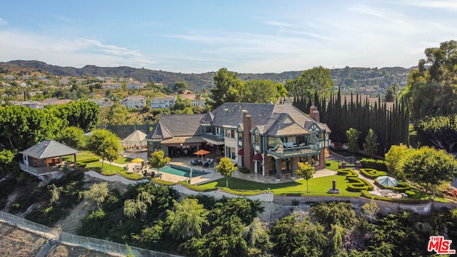 bird's eye view with a mountain view