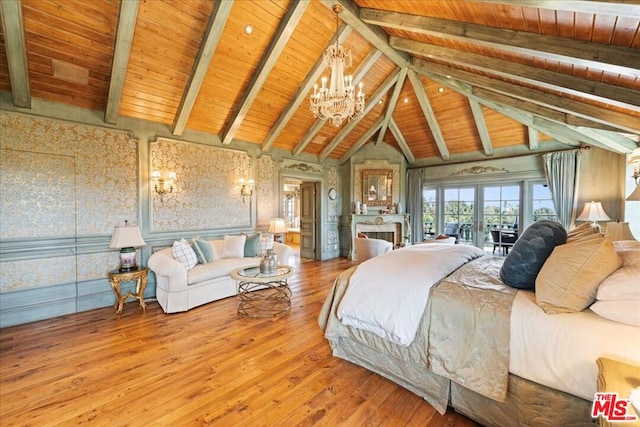 bedroom with wood-type flooring, an inviting chandelier, high vaulted ceiling, wooden ceiling, and beam ceiling