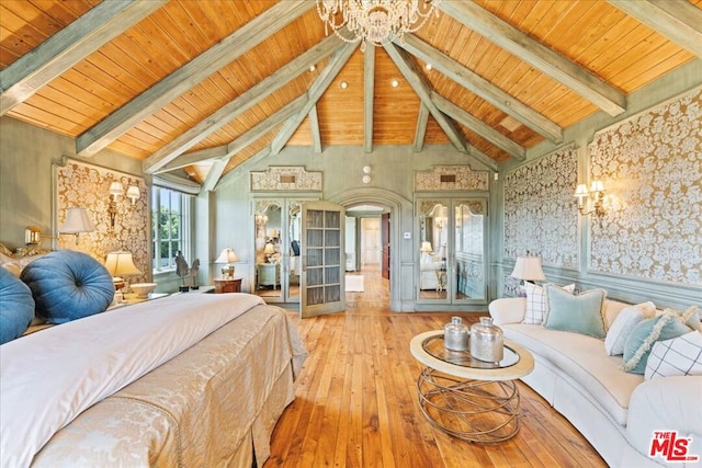 bedroom with wooden ceiling, a notable chandelier, wood-type flooring, french doors, and beam ceiling