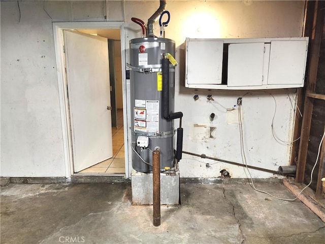 utility room with secured water heater