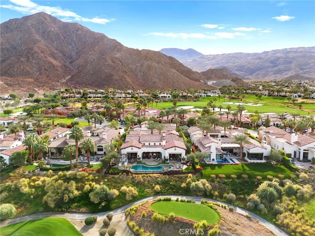 birds eye view of property featuring a mountain view