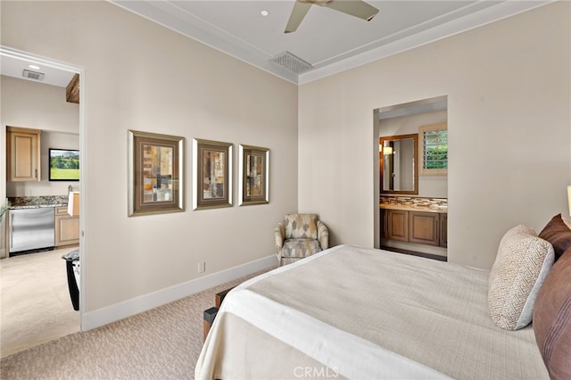 bedroom featuring light carpet, connected bathroom, ornamental molding, and ceiling fan