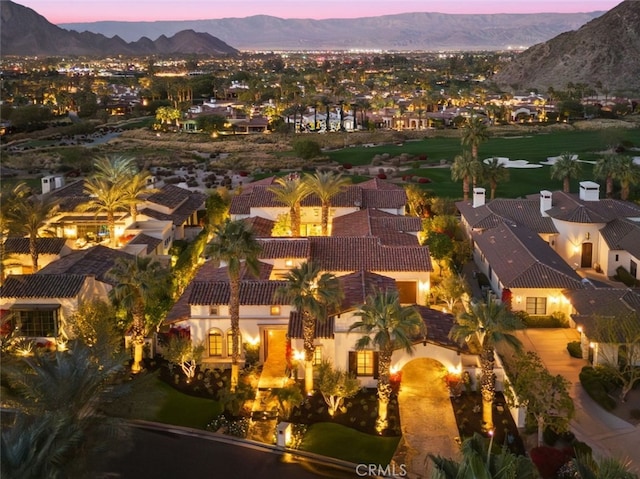 aerial view at dusk with a mountain view