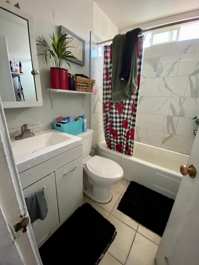 full bathroom featuring toilet, vanity, shower / bathtub combination with curtain, and tile patterned flooring