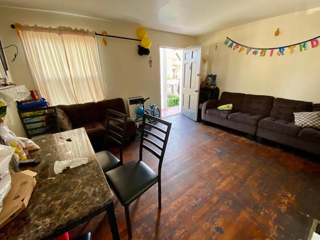 living room with dark hardwood / wood-style floors