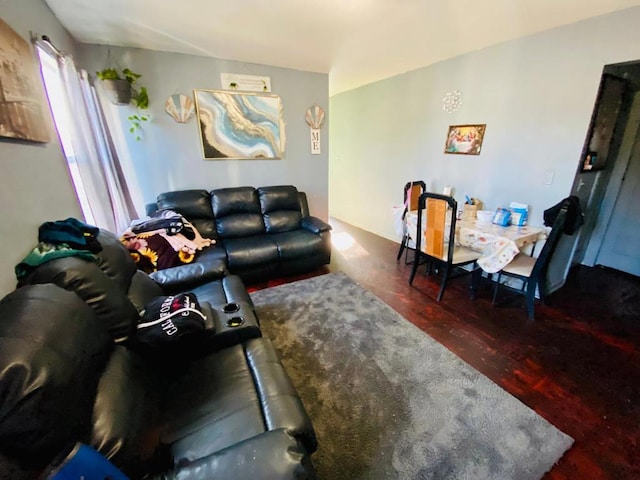 living room with dark hardwood / wood-style flooring