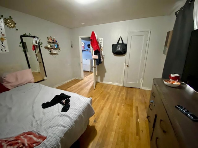 bedroom with light hardwood / wood-style flooring