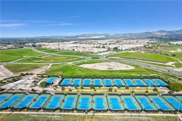 birds eye view of property with a mountain view