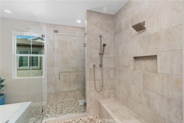 bathroom with a stall shower