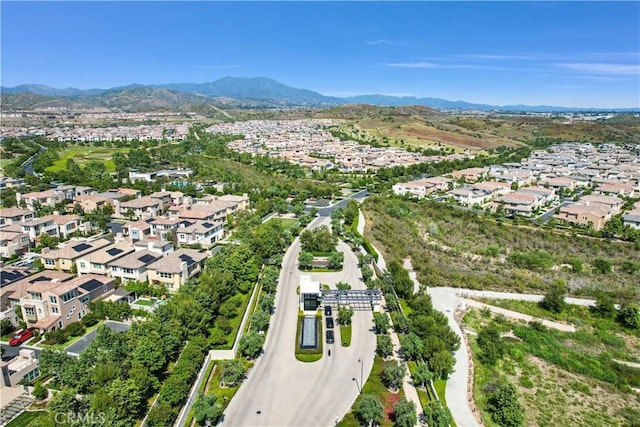 aerial view featuring a mountain view and a residential view