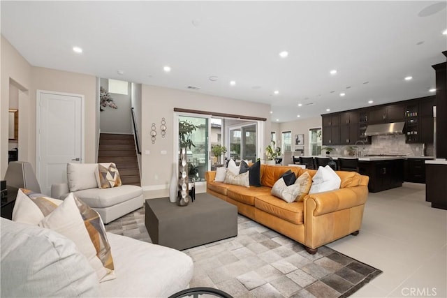 living room with visible vents, stairway, recessed lighting, and baseboards