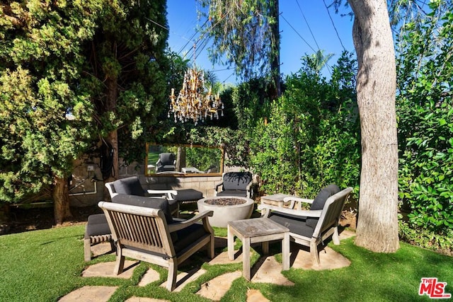 view of patio featuring a fire pit