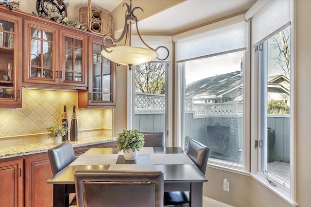 dining space featuring a healthy amount of sunlight