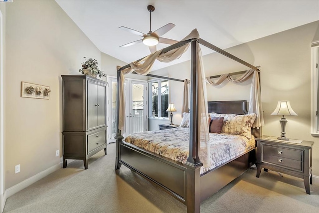 bedroom featuring carpet, vaulted ceiling, and ceiling fan