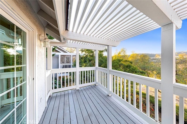 wooden terrace featuring a pergola