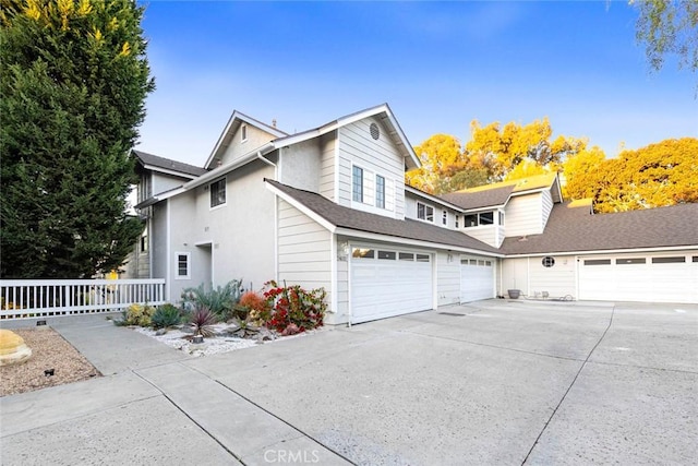 view of property exterior with a garage