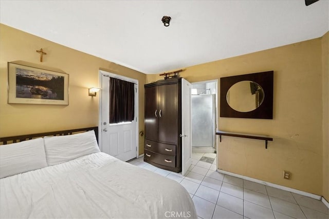 bedroom featuring light tile patterned floors