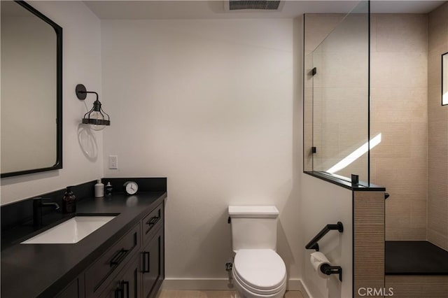 bathroom with a shower, toilet, and vanity