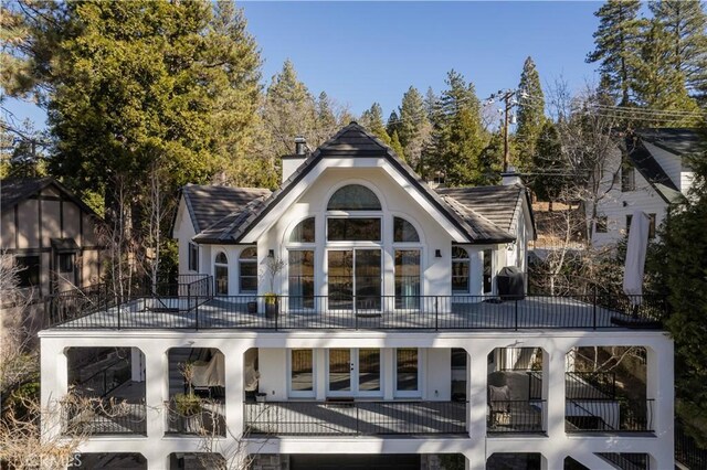 rear view of house with a balcony