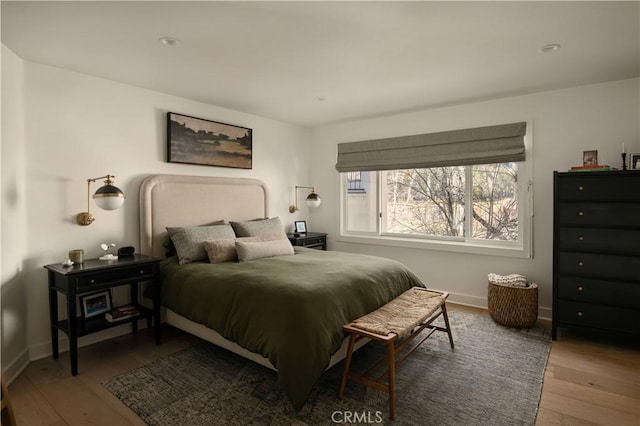 bedroom featuring hardwood / wood-style flooring