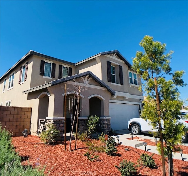 front facade with a garage