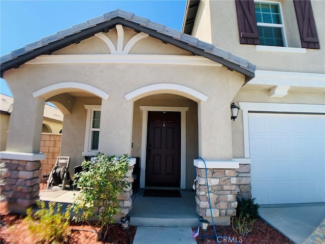 property entrance featuring a garage