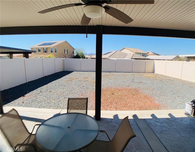 view of patio / terrace featuring ceiling fan