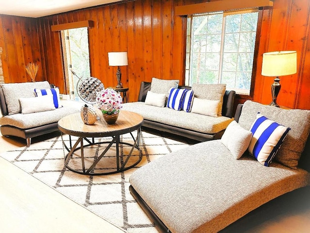 living room featuring wood walls