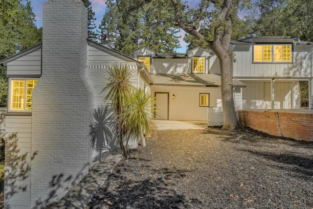 back of house with a patio area