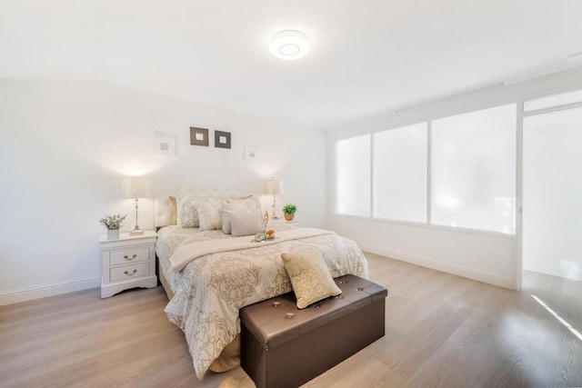 bedroom with light hardwood / wood-style flooring