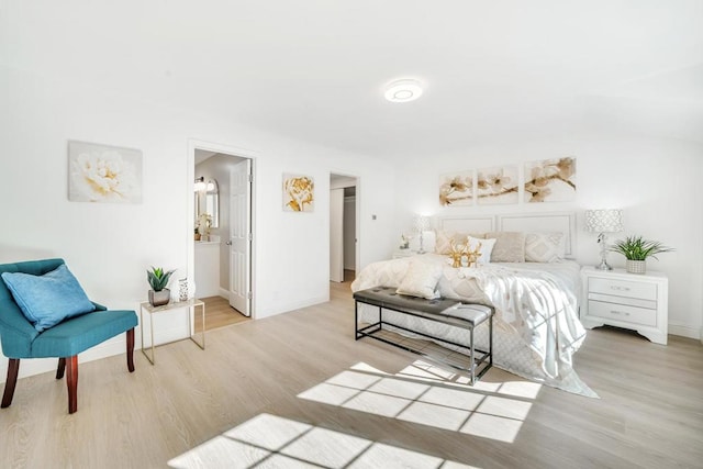 bedroom featuring light hardwood / wood-style floors