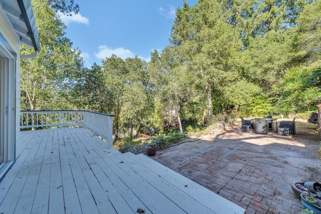 wooden deck featuring a patio