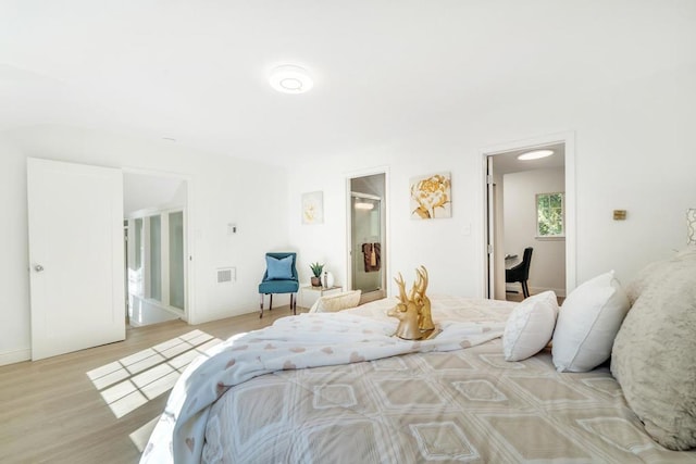 bedroom featuring light wood-type flooring