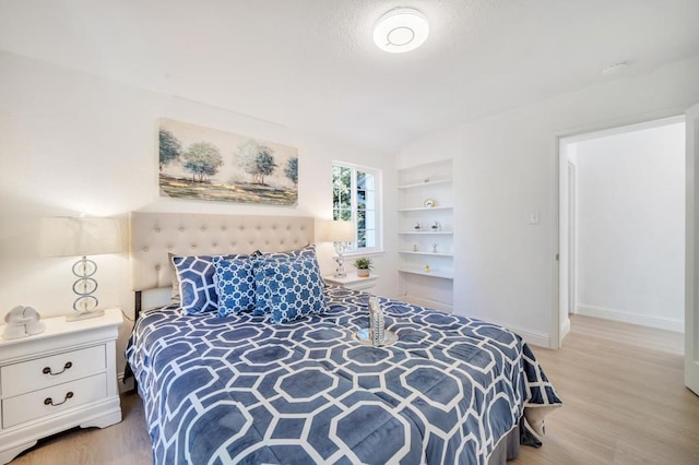 bedroom featuring light hardwood / wood-style flooring