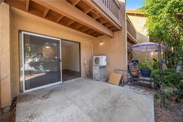 view of patio / terrace featuring a balcony and ac unit