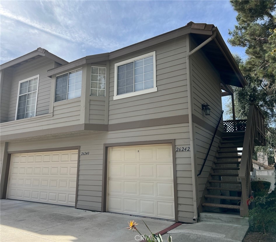 view of property exterior with a garage