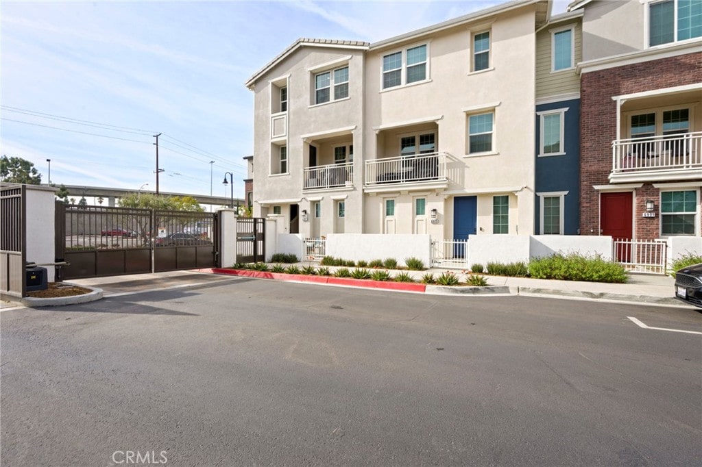 view of property with fence