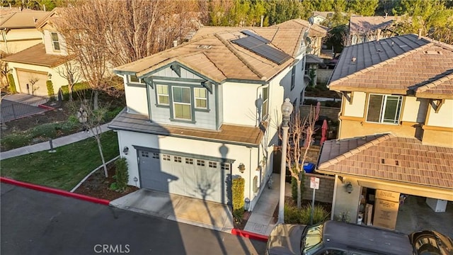 view of front of home with a garage