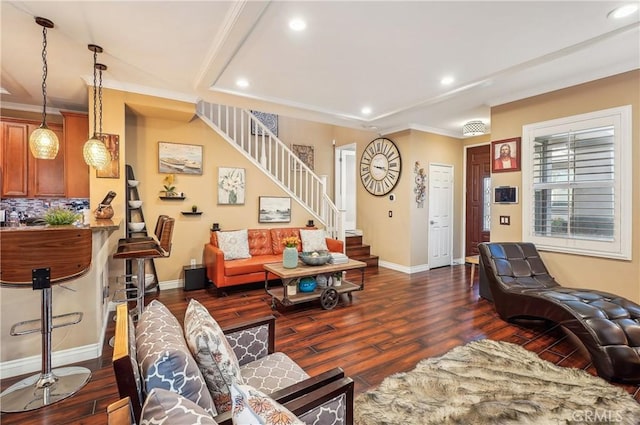 living room with crown molding and dark hardwood / wood-style flooring