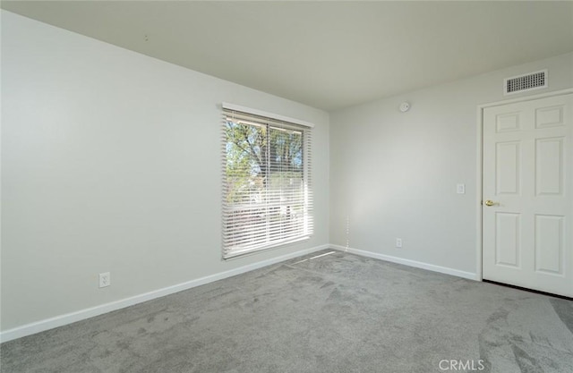 view of carpeted spare room