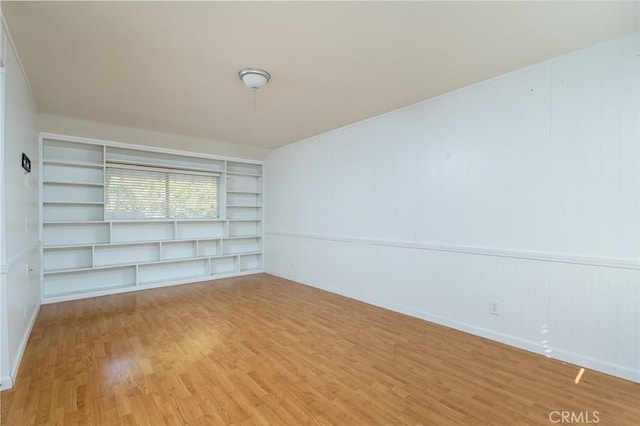 spare room featuring hardwood / wood-style flooring