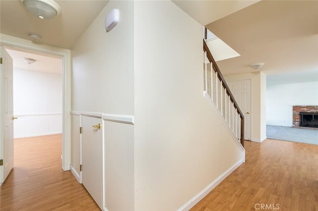 hallway featuring light wood-type flooring