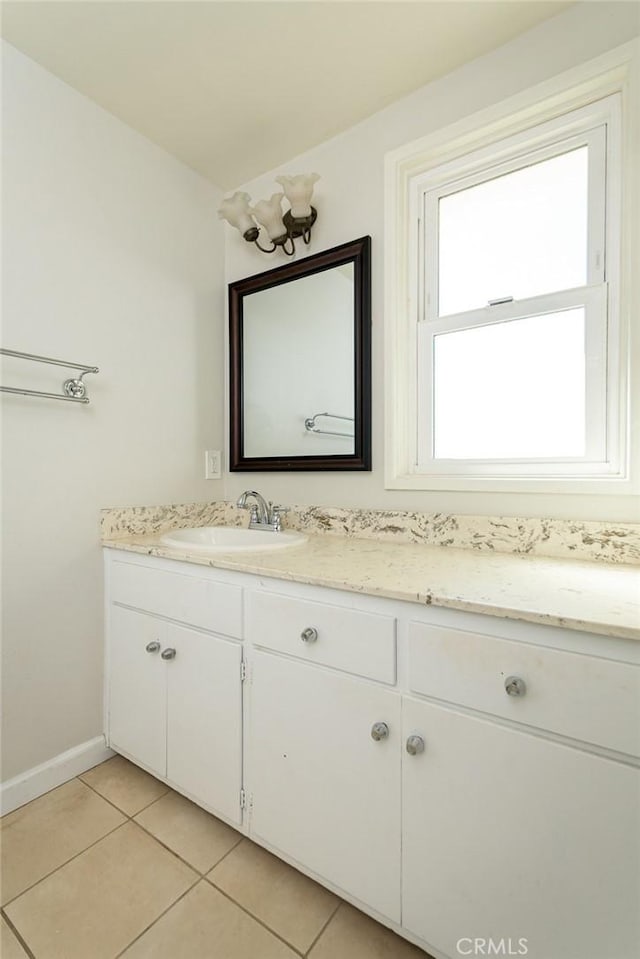 bathroom featuring tile patterned floors and vanity