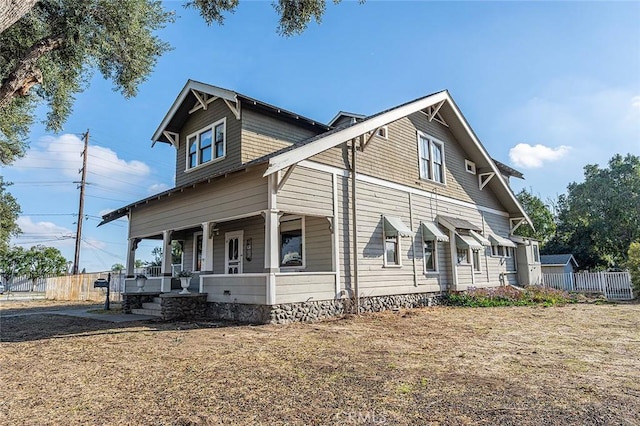 view of home's exterior featuring a porch